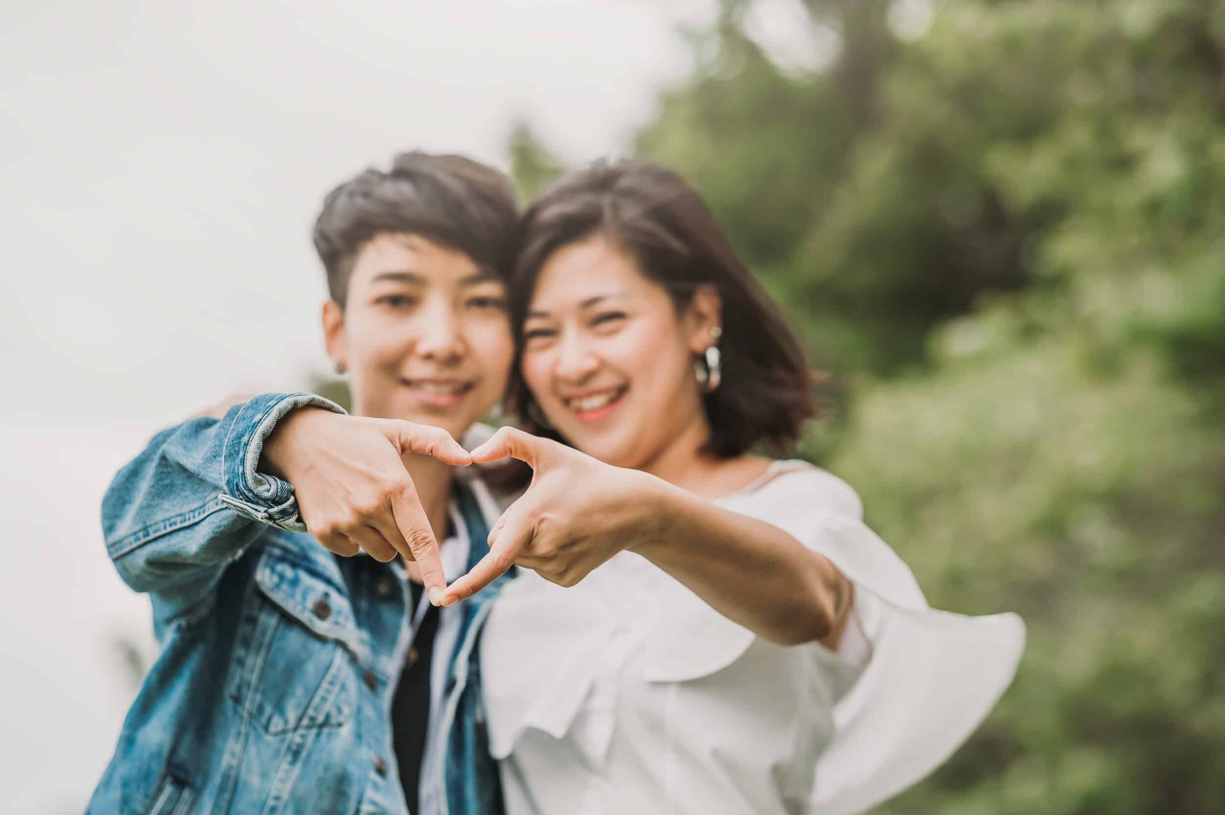 Two happy Asian lesbian couple in love